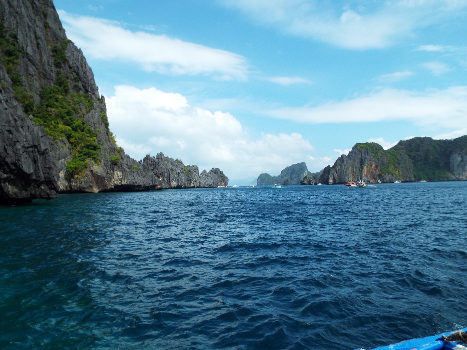 Deep blue sea, Blue | Ocean | Sea | Mountain | Island | Green | Sky | Scenery | Boat | Palawan | Travel